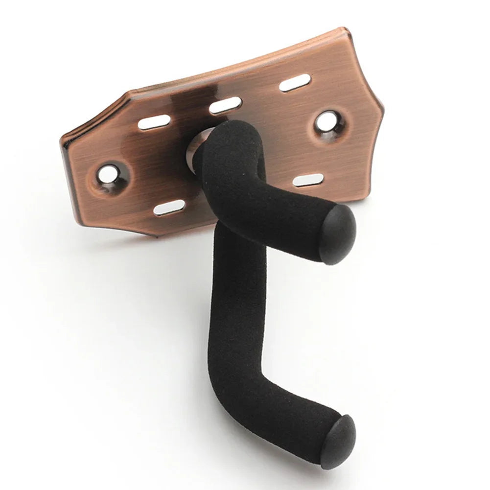 A copper-toned guitar wall mount hanger with a padded black yoke and mounting plate.
