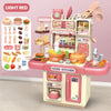 A light red interactive kids pretend play kitchen set with various cooking tools and food items.