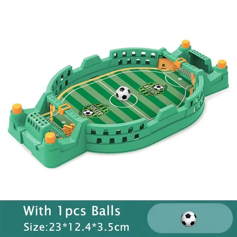 A green tabletop foosball game set with rods and balls on a green playing surface.