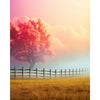 A vibrant sunset landscape featuring a large red tree and a golden field under soft pink and orange skies.