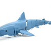A light blue remote control shark toy with a white snout and fins, shown in profile.