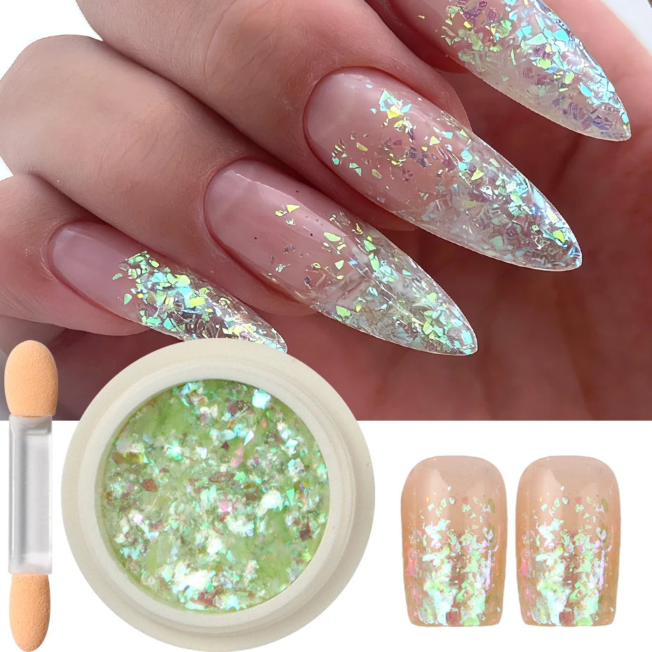 A hand displays iridescent opal and mermaid chrome nail glitter polish applied to fingernails, next to a jar of green glitter