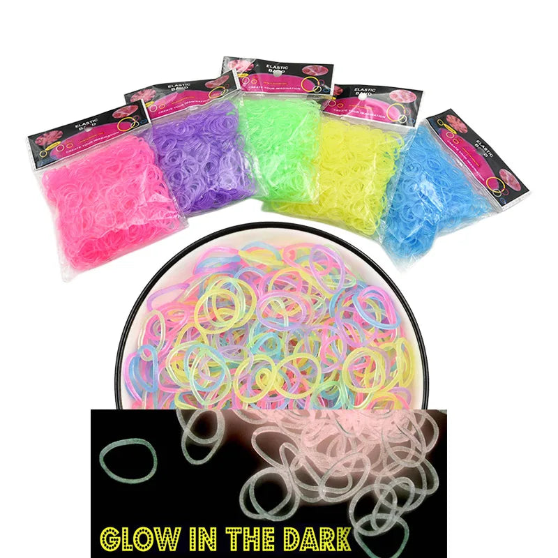 A collection of glow-in-the-dark colored fibers and plastic sheets for making loom band bracelets.