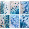 A collection of blue butterflies flying over the ocean waves and sea foam.