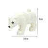 A white plastic zoo animal building block shaped like a bear, with dimensions of 5cm high and 10cm long.