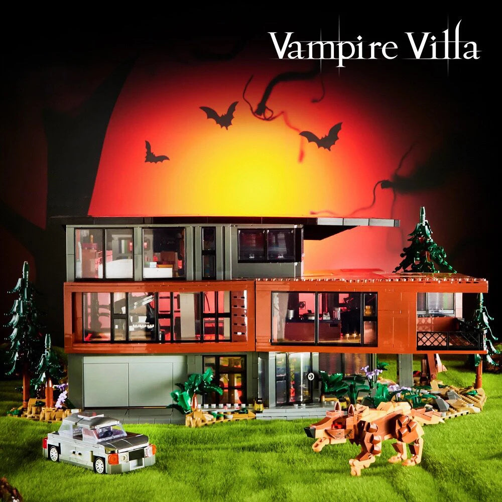 A model of a Vampire Villa building set featuring a modern house, trees, and various accessories on green grass.