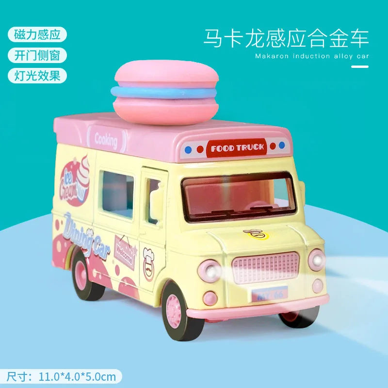 A yellow toy food truck shaped like a burger car with pink accents and light features.