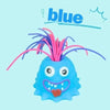 A blue, squishy monster stress relief toy with pink and purple hair.