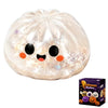 A glowing, round squishy stress ball toy with a cute face design.