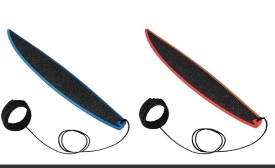 A black and blue mini finger surfboard skateboard toy with attached elastic bands.