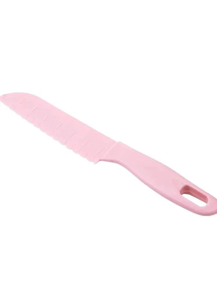 Pink plastic kid-friendly safety knife set with a handle and blade.