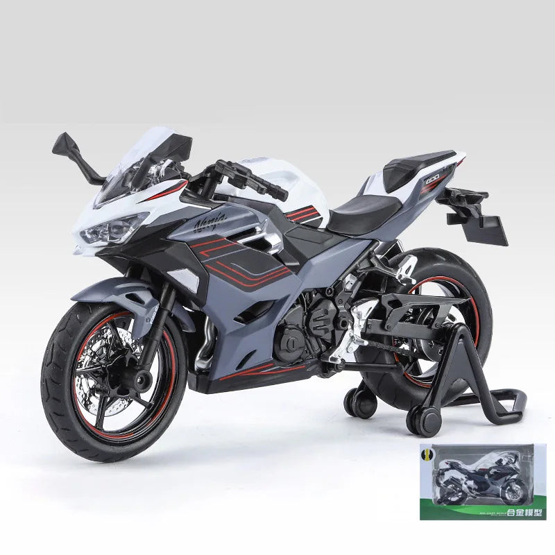 A silver and black 1:12 scale Ninja motorcycle diecast model with lights and sound