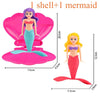 A pink mermaid dive toy featuring a female figure with purple hair and a teal tail emerging from an opening shell.