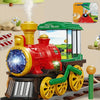 A yellow and red electric steam train toy truck with lights and a green vintage train engine on a track.