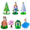 A set of crystal growing trees and flowers used for a science kit, featuring Christmas-themed decorations.