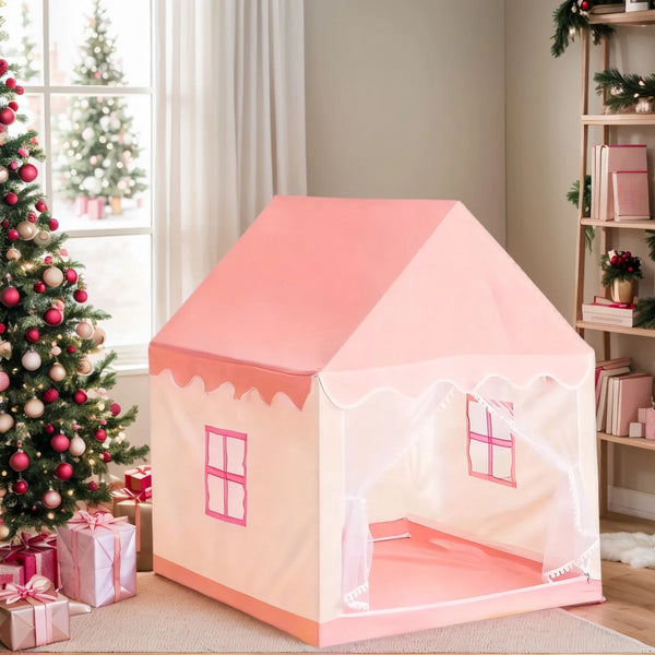 A pink portable fairy tale play tent with a pitched roof and window details set up indoors.