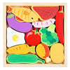 A wooden puzzle board featuring various colorful food shapes like fish, tomatoes, and vegetables for children.