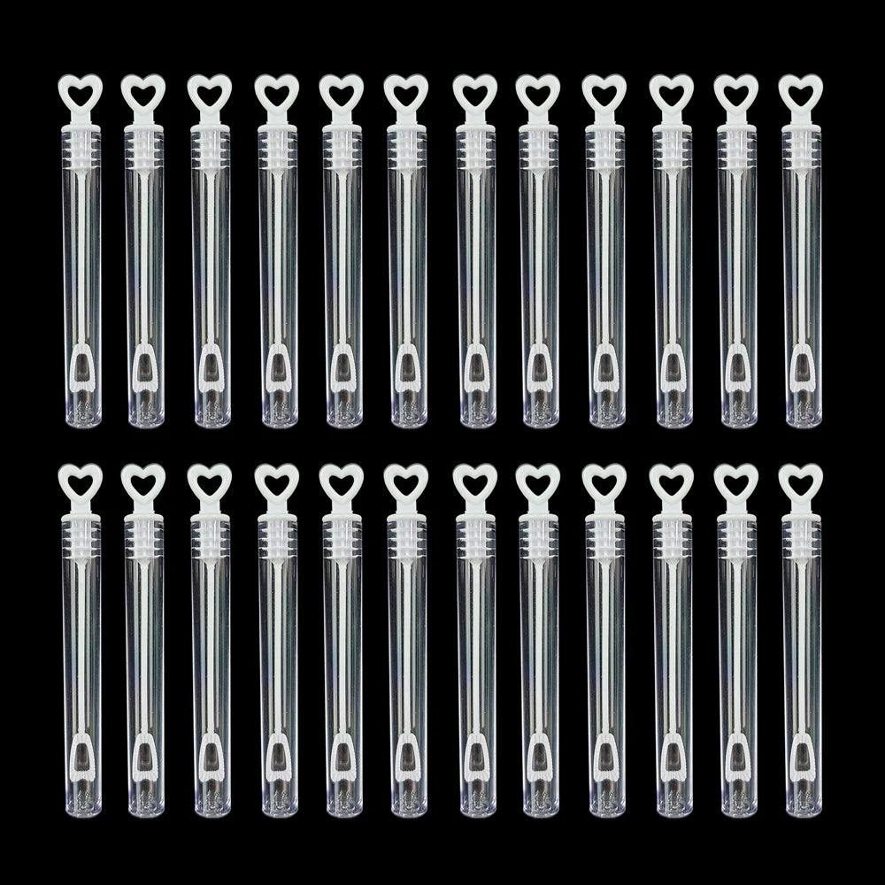 A row of clear mini bubble wands for party favors and celebrations.