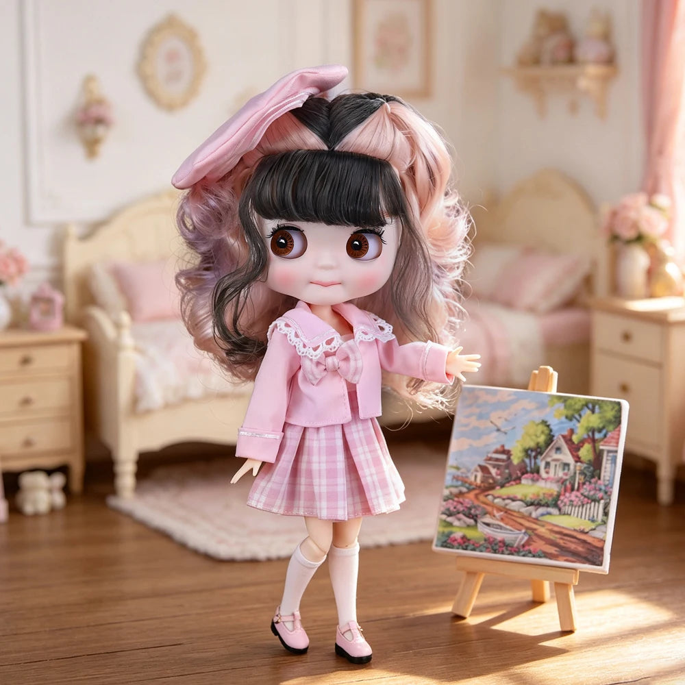 A pink-haired fashion doll with a frilly pink outfit and a large pink bow is displayed on a wooden floor.