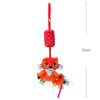 An orange and black striped cat plush toy hanging from a red rattle chain.