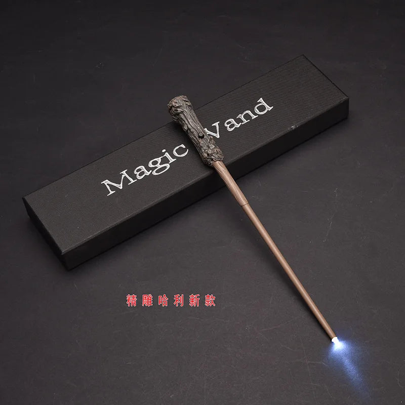 A dark wooden magic wand with a textured handle and a glowing blue tip is displayed on a dark surface.