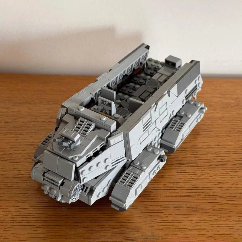 A gray plastic building blocks set depicting an Imperial Troop Transport vehicle.