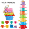 A set of colorful ocean stack cups and bath toys for children