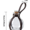A clear glass potion bottle with a brown leather strap and cork stopper, designed for cosplay.