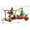 A set of Christmas building blocks featuring various figures and decorations like a tree, gifts, and characters.
