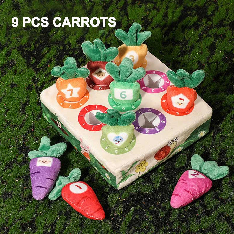 Nine colorful carrot pull toys for toddlers arranged on a green surface.