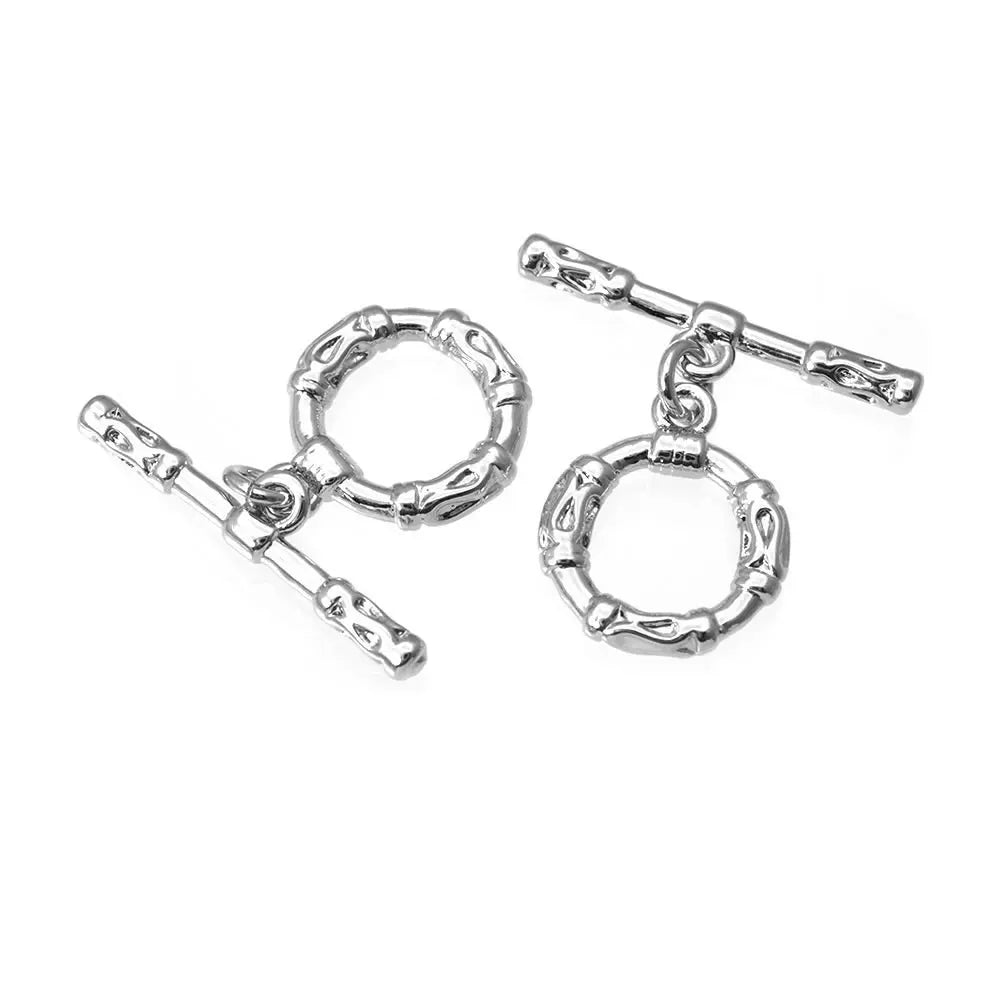 A pair of 18K gold round O-toggle clasps for bracelets and jewelry making.