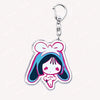 Acrylic keychain featuring a chibi girl with blue hair and a pink bow.