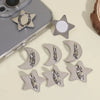 Silver star and crescent moon decorative phone charms with adhesive backing