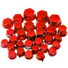 A collection of red hexagonal decorative motorcycle screw cap covers.