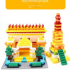 A LEGO set depicting an advanced phase structure with a yellow and orange fortress and tower.