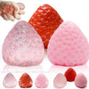 Various pink and red strawberry squishy fidget toys shown in different shapes and textures