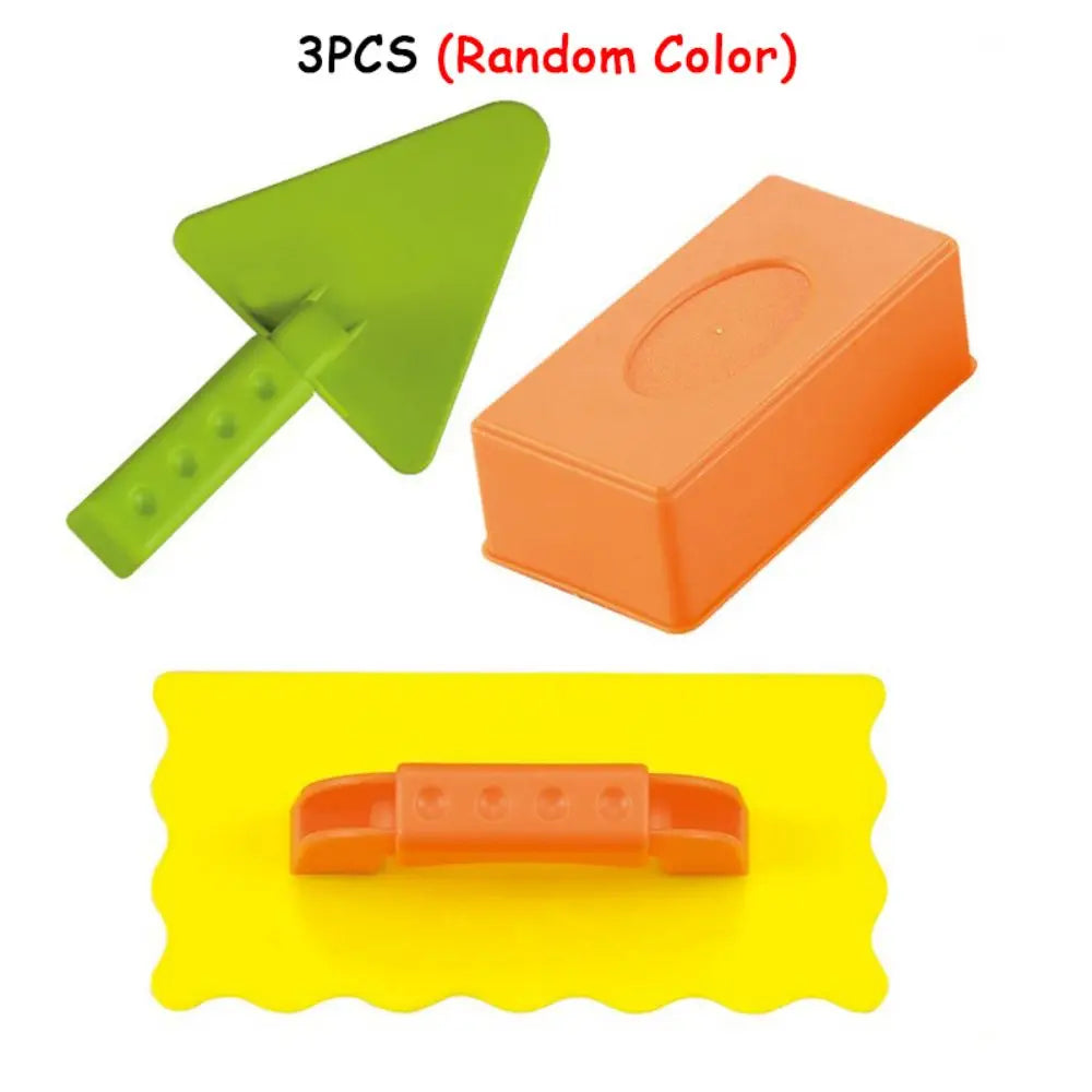Three random colored plastic molds for making sand and snow bricks like castles or forts