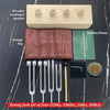 A set of four tuning forks made of metal for sound healing and meditation