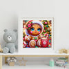 A colorful cartoon kit featuring a cute character with rhinestones and various craft materials for diamond painting.