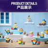 A display of POP MART Minions collectible figures in various poses and colors arranged on a white table.