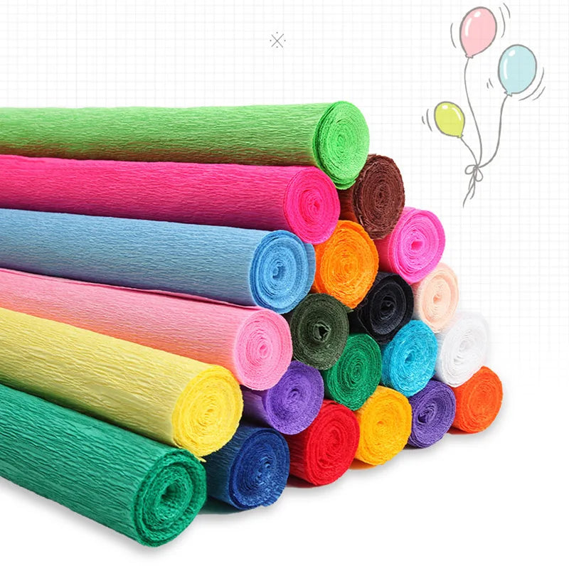 A collection of colorful crepe paper rolls in various shades of green, pink, blue, yellow, and orange.