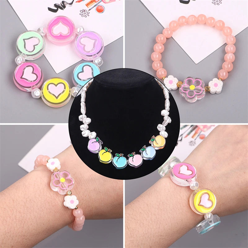 A collection of colorful enamel charm beads and bracelets for DIY jewelry making displayed on white cards and wrists.