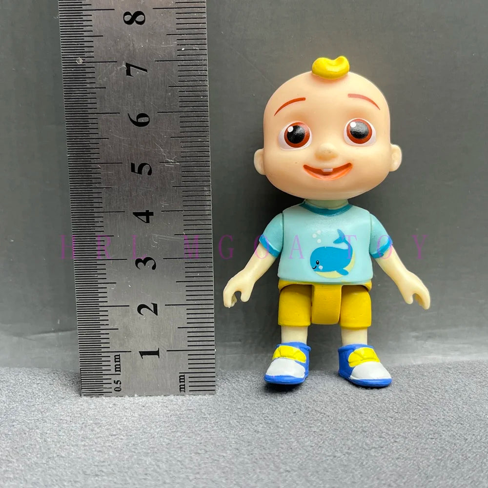 A small, cheerful cartoon figurine of a boy with blonde hair and blue shirt and yellow shorts.