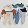 Toddler boys color block sweatshirt and pants set featuring various muted colors like beige, brown, blue, and gray.