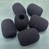 A pile of ten black foam covers designed to replace microphone foam for meeting microphones.
