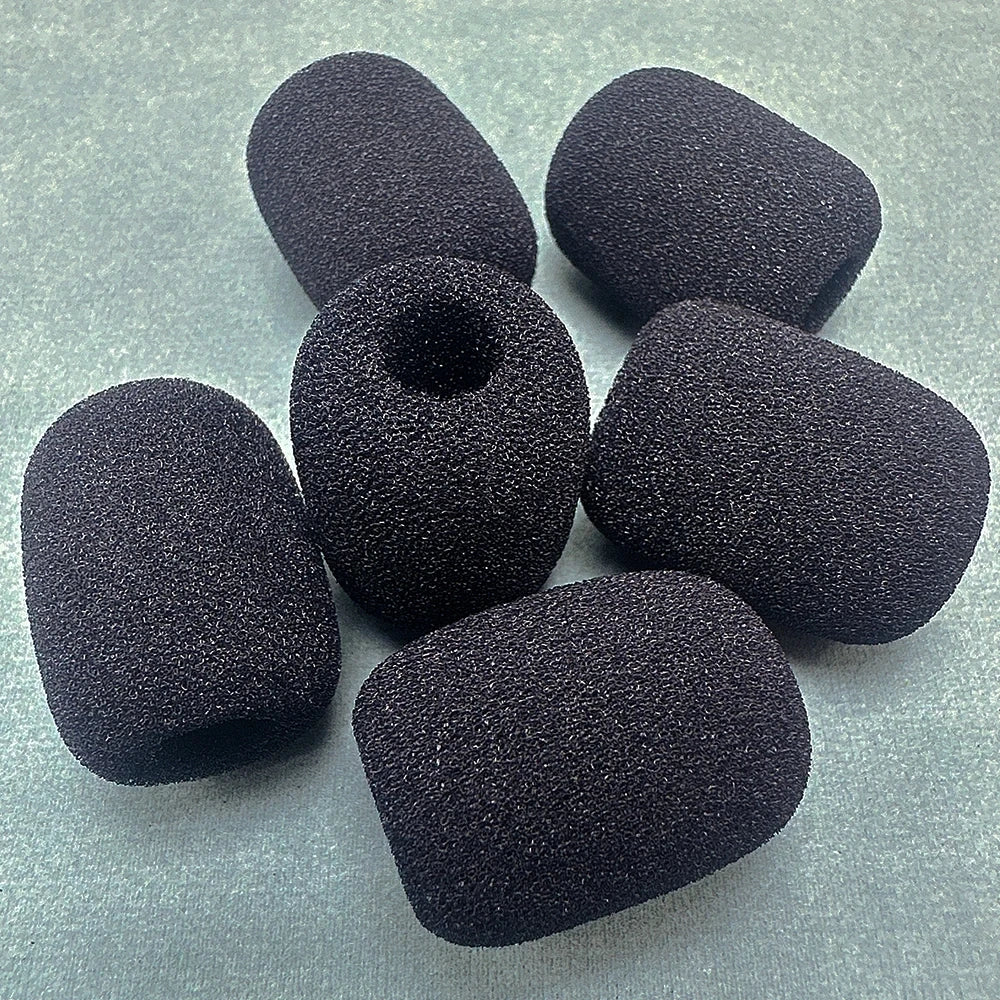A pile of ten black foam covers designed to replace microphone foam for meeting microphones.