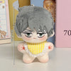 A gray-haired plush keychain featuring an anime character with green eyes and a yellow checkered collar.