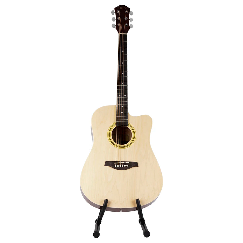 A light-colored acoustic guitar is displayed on a foldable metal stand.