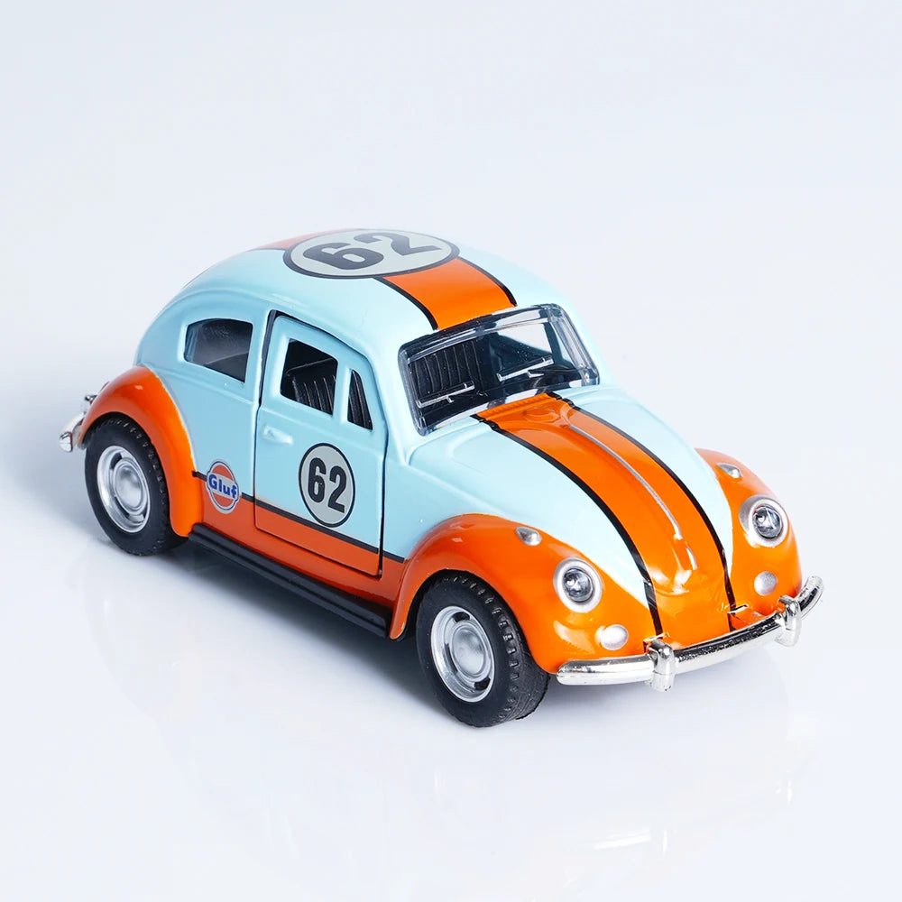 A 1:36 scale die-cast retro Beetle car painted light blue and orange with racing numbers on the hood.