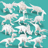 A collection of white plastic dinosaur figures arranged on a teal background.